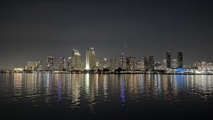 San Diego downtown skyline at night reflected on the bay water